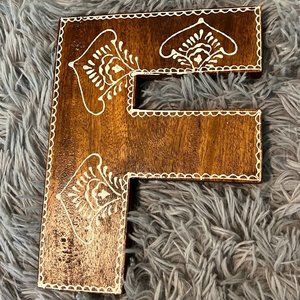 Urban Outfitters "F" Initial Sign